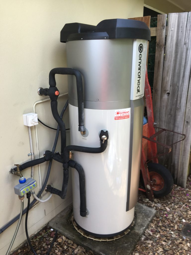 Outdoor heat pump hot water system installed at a home in Bribie Island