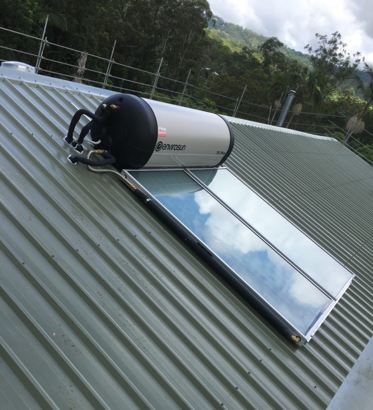 Solar hot water system installed on a corrugated metal roof in Bribie Island