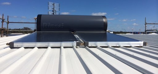 Solar hot water system installed on a corrugated metal roof in Bribie Island