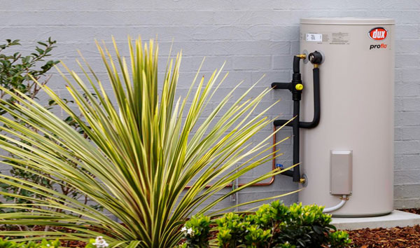 Outdoor hot water system installed beside a home in Bribie Island